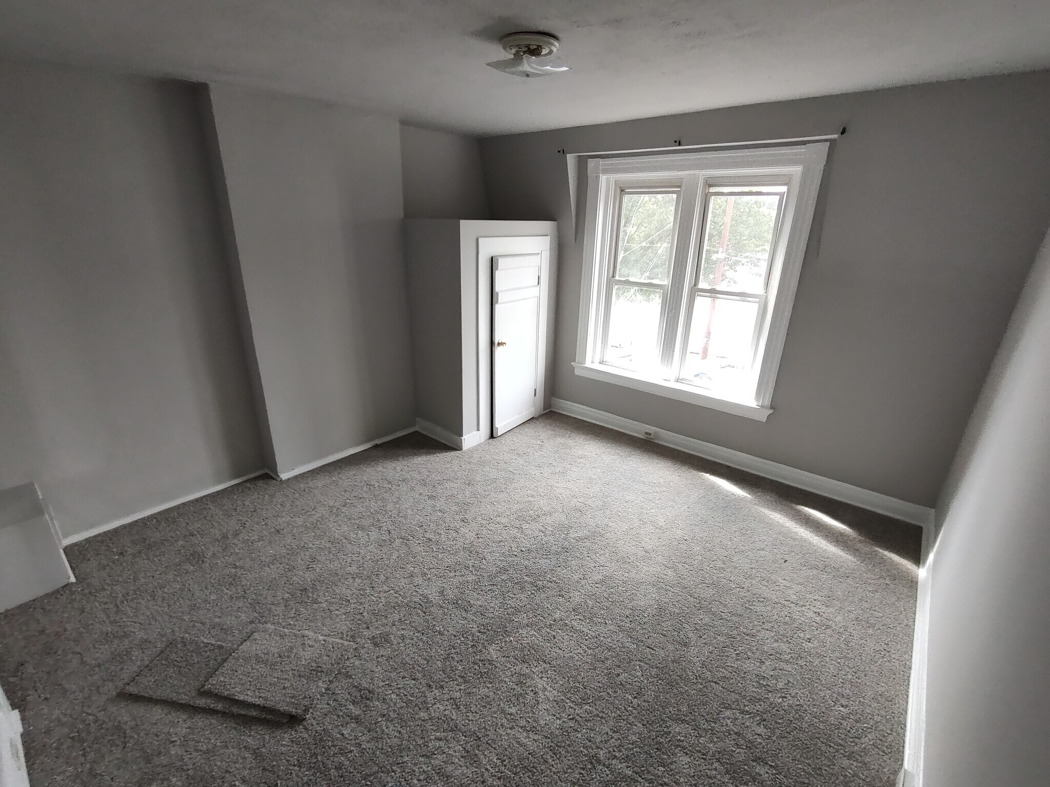 Bed #1 15 x 15 New carpet. Plenty of closet space. - 208 E 9th St