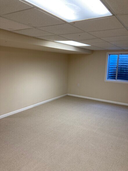 Finished basement with a window - 12 Gail Ct