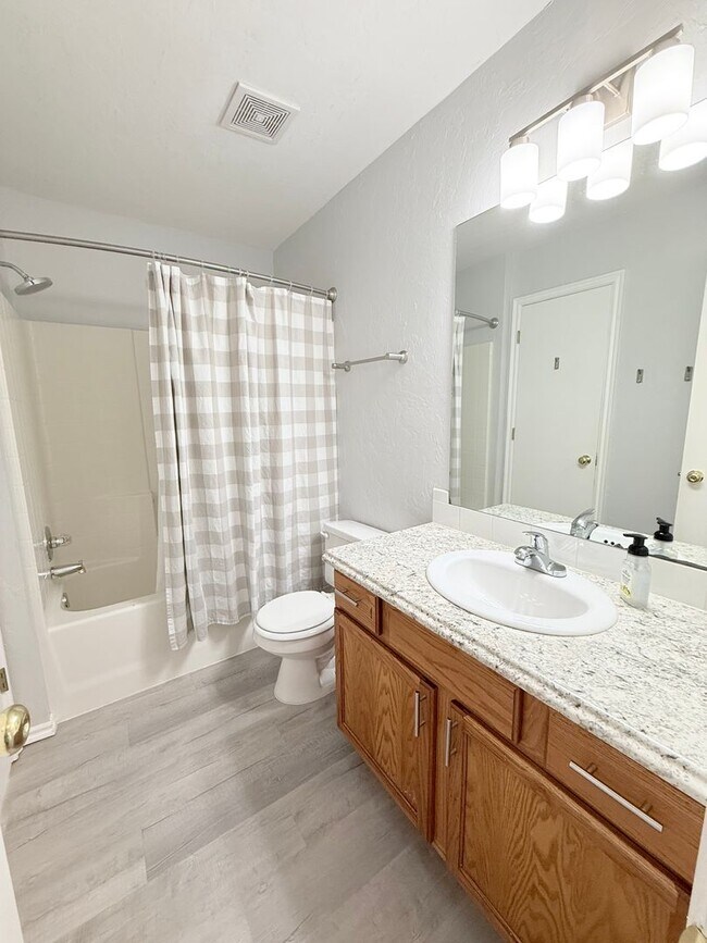 Building Photo - 4 Bedroom - 2 bath duplex located near campus and State Highway 9