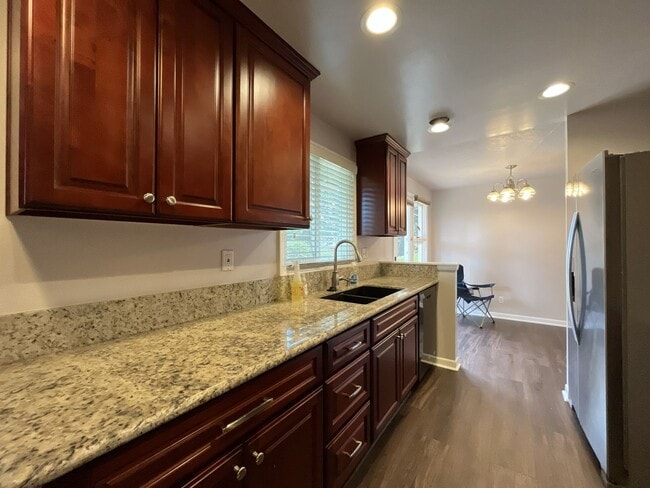 Building Photo - Charming Single-Level 3 Bedroom Home with Spacious Fenced Backyard, Landscaping Included & Great ...