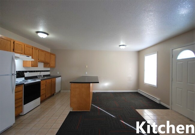 Building Photo - 115-117 South Plum