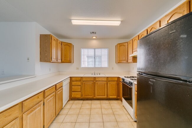 Building Photo - Charming Second-Floor Condo with Two Bedrooms and Fireplace