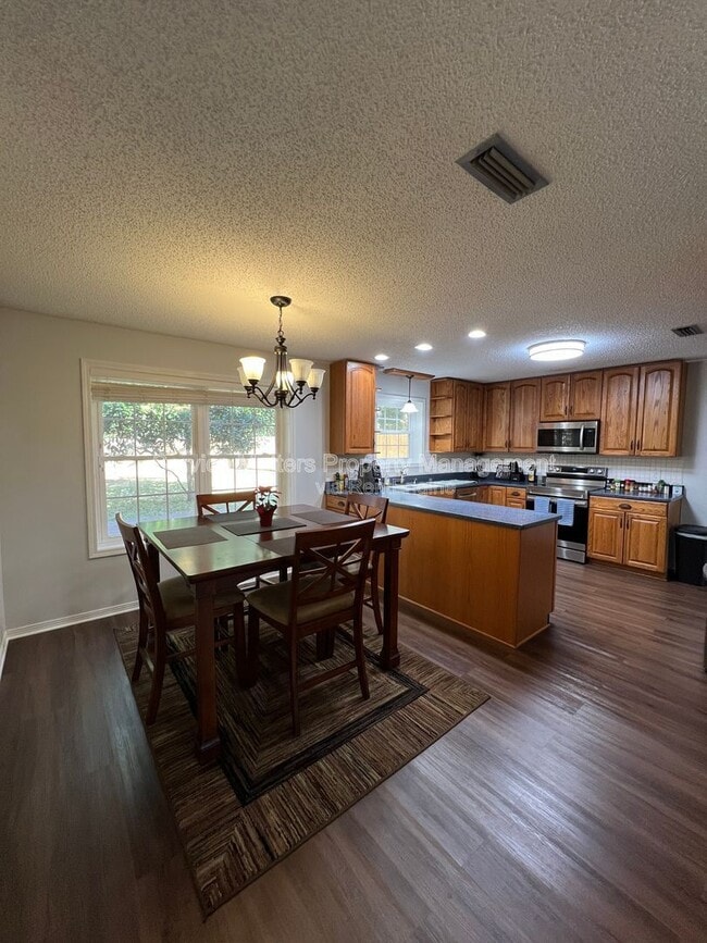 Building Photo - 6004 Players Pl