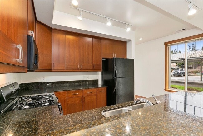 Building Photo - Spacious 3-Bedroom Condo/Townhome in Peaceful Cordata Neighborhood