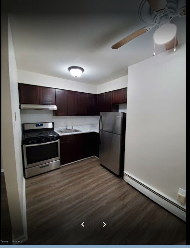 Building Photo - About Regency Court Apartments