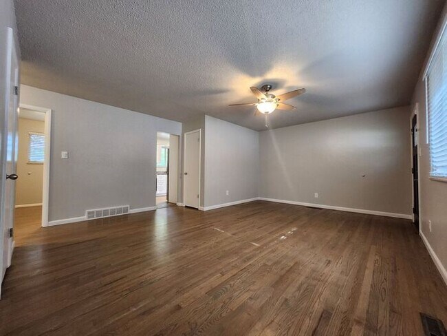 Building Photo - Move-In Ready 5-Bedroom Gem – Enjoy 50% Of...