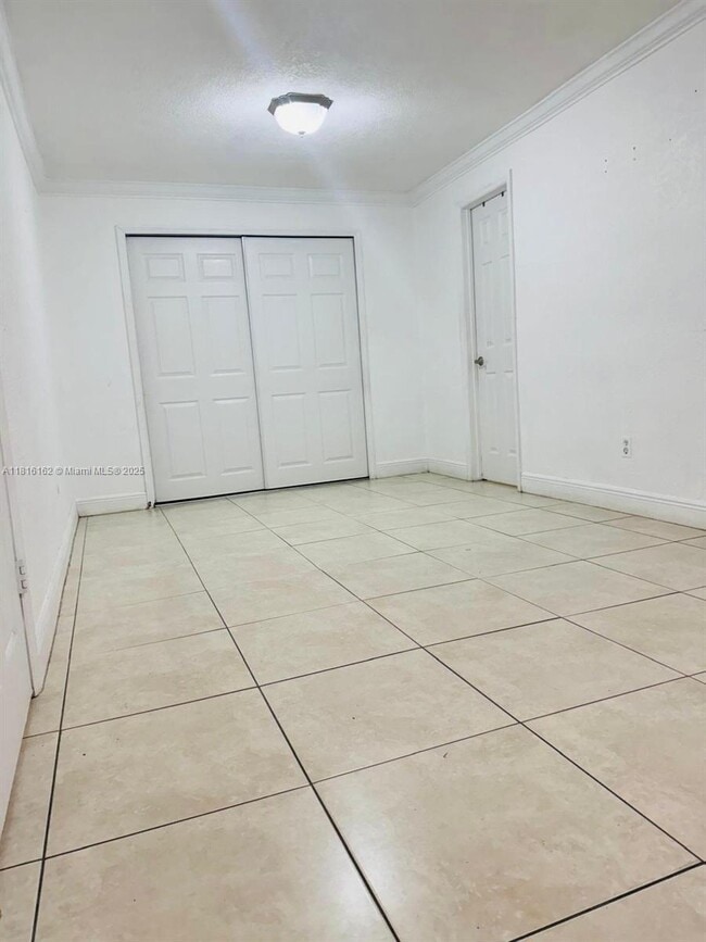 Building Photo - 6975 W 10th Ct