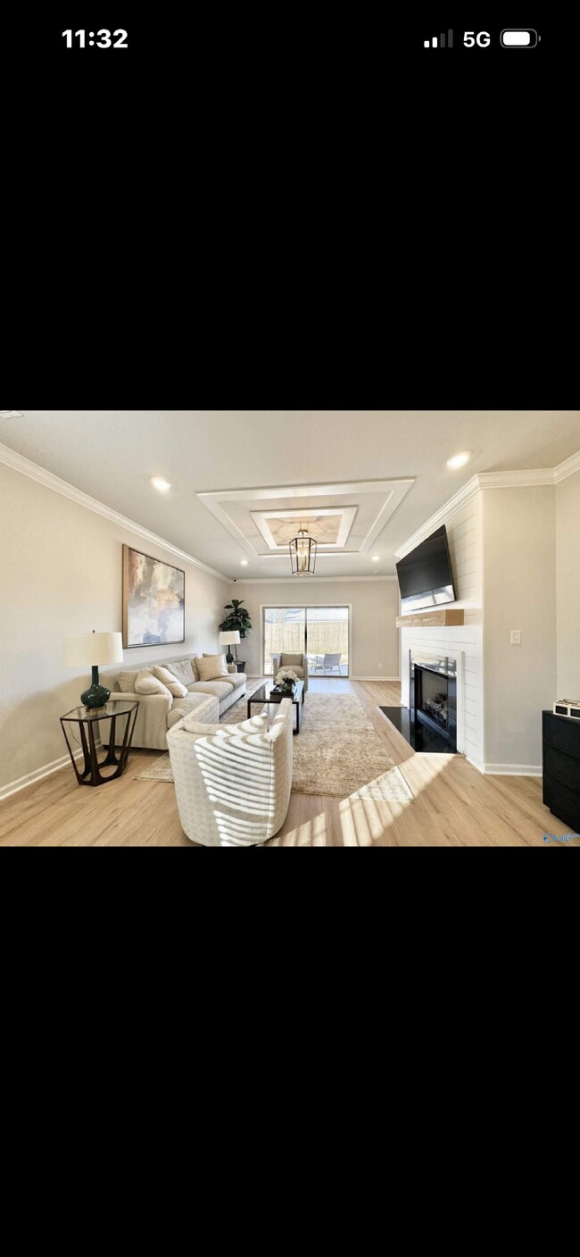 Building Photo - "NEWLY BUILT- Spacious 4-Bedroom Haven with Granite Elegance and Cozy Fireplace in Harvest"