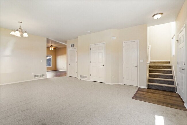 Building Photo - Spacious End-Unit Townhome with Greenbelt Views and Detached 2-Car Garage