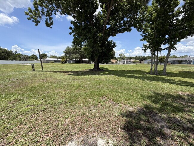 Building Photo - "Charming 3-Bedroom Home with Gleaming Hardwood Floors!"