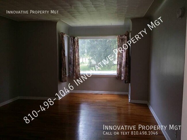 Building Photo - Spacious 4 bedroom , 1 1/2 bath home in Ga...