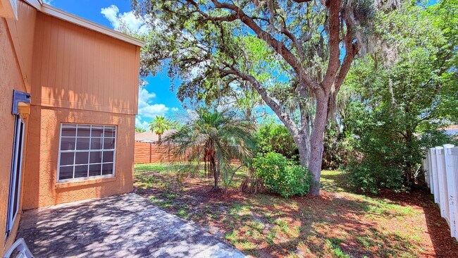 Building Photo - Bright 3/2 Home Near UCF with Vaulted Ceilings & Spacious Backyard!