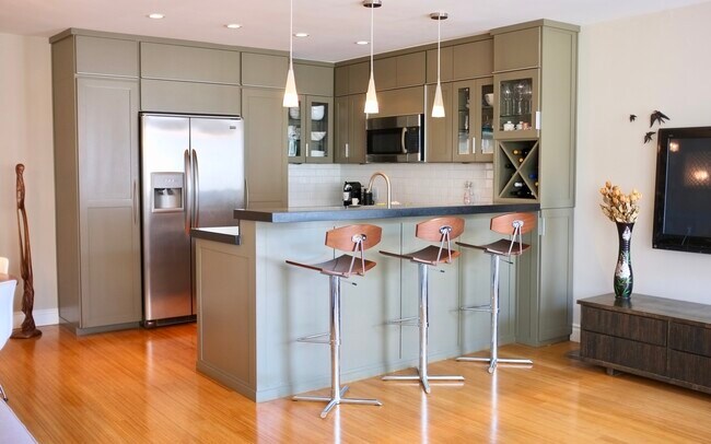Open concept kitchen with stainless steel appliances - 2431 3rd St