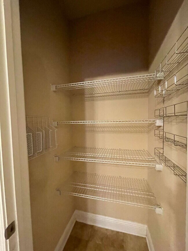 Building Photo - Coming Soon!! "Spacious 4-Bedroom Oasis wi...