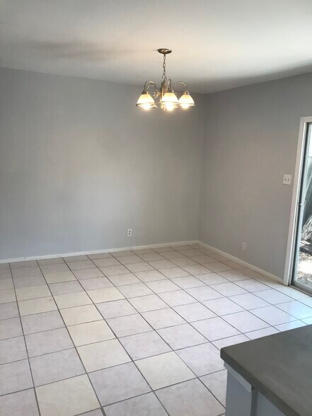 Dining area off of kitchen with view of nice courtyard - 1338 Churing Dr