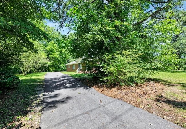Primary Photo - 4 bedroom 2 Bath - Available Now on Main A...