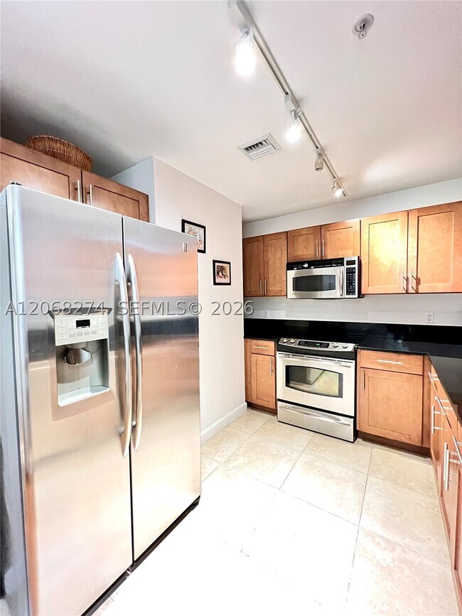 Building Photo - 8390 SW 72nd Ct