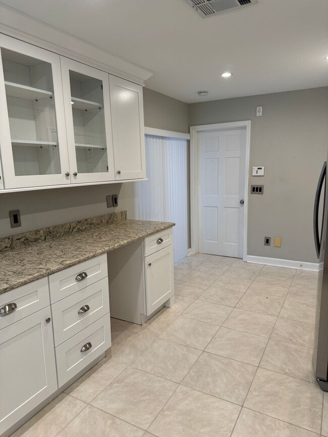 Building Photo - COMING SOON!! Highly Desirable DR PHILLIPS 3 bedroom 2 bath townhome with double car garage