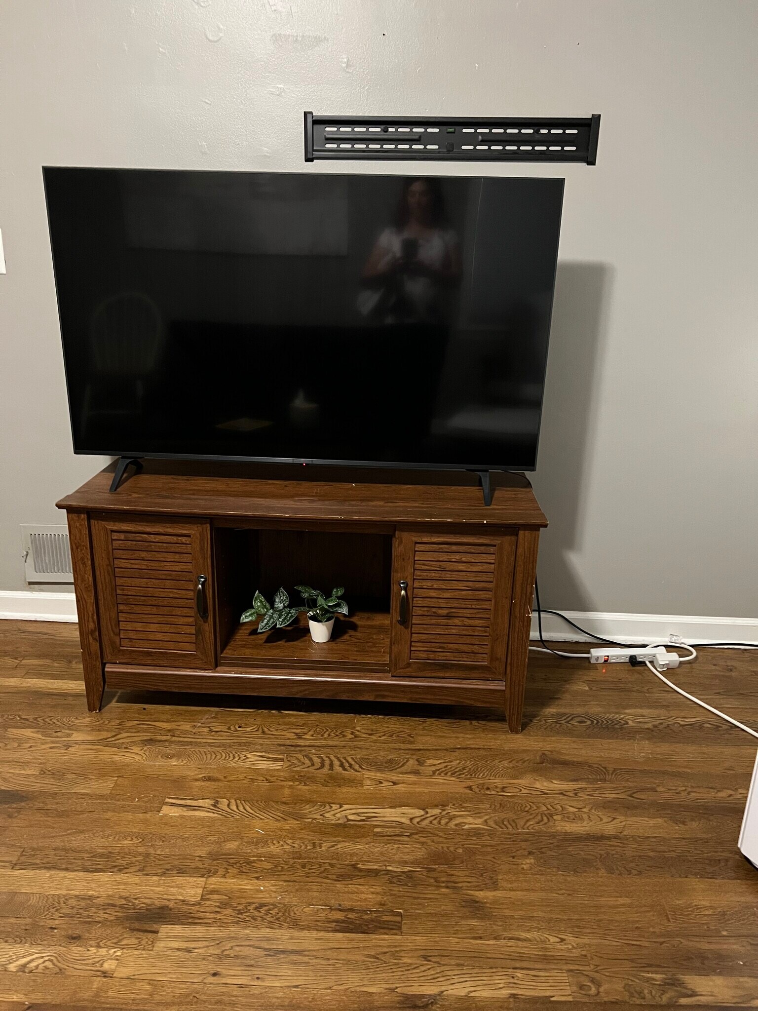 TV and TV stand - 4622 Cass St