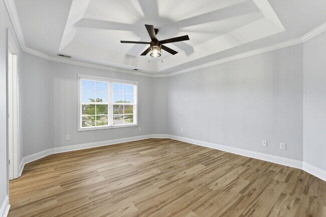 Building Photo - Now available, freshly painted with a community pool!