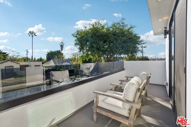 Building Photo - 731 N Curson Ave