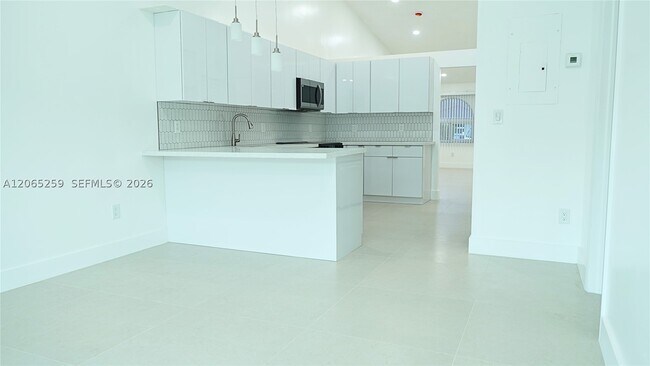Building Photo - 5661 W 21st Ave