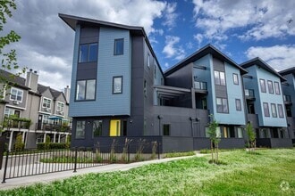Building Photo - Riverside Townhomes - Waterfront Living in...