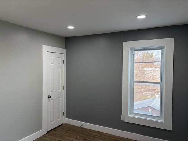 Building Photo - Newly Renovated 2- Story Townhome with Front Porch and Back Yard