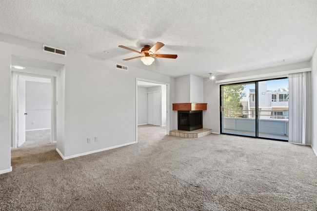 Building Photo - Charming 2 Bedroom Second Story Condo with easy access to everything!