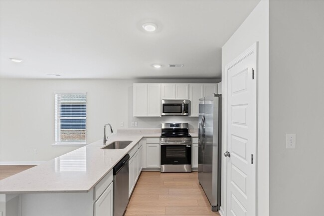 Building Photo - New 3BR Home in Whispering Woods – Modern ...