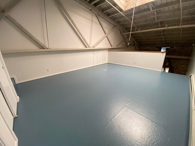 Enormous upstairs master bed/work space - 1018 4th Ave