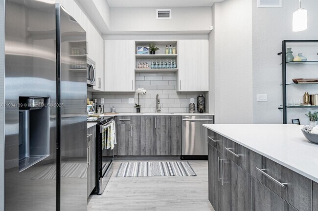 Building Photo - 9135 W Commercial Blvd