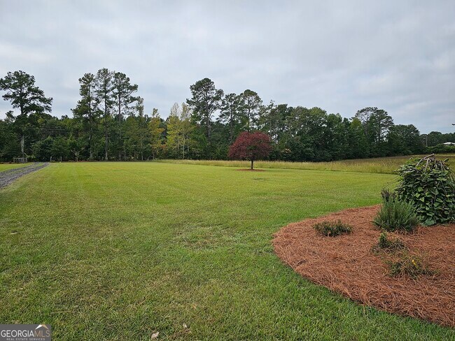 Building Photo - 6090 Strickland Town Rd