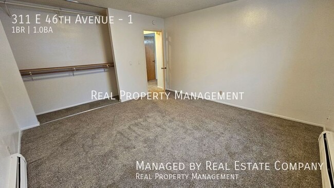 Building Photo - 311 E 46th Ave