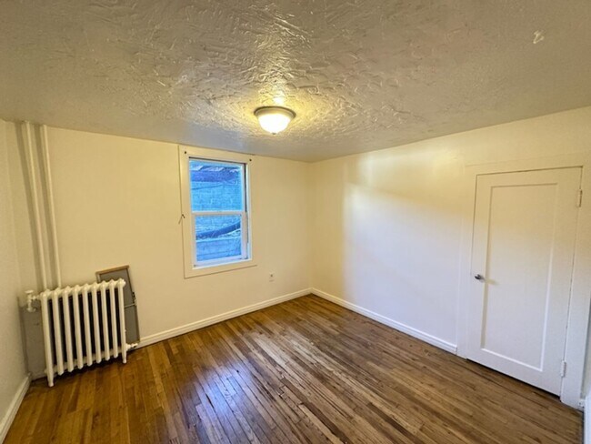 Building Photo - 285-287 N Center St Tri Plex