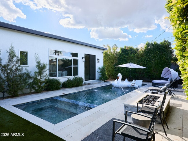 Building Photo - 8620 E Plaza Ave