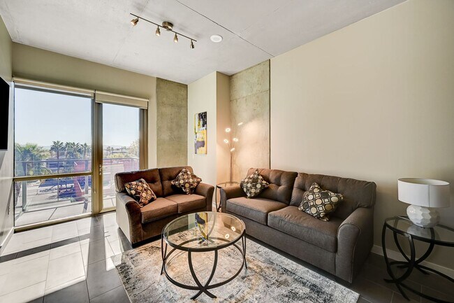 Building Photo - Fully Furnished 4th-Floor Condo with Stunn...