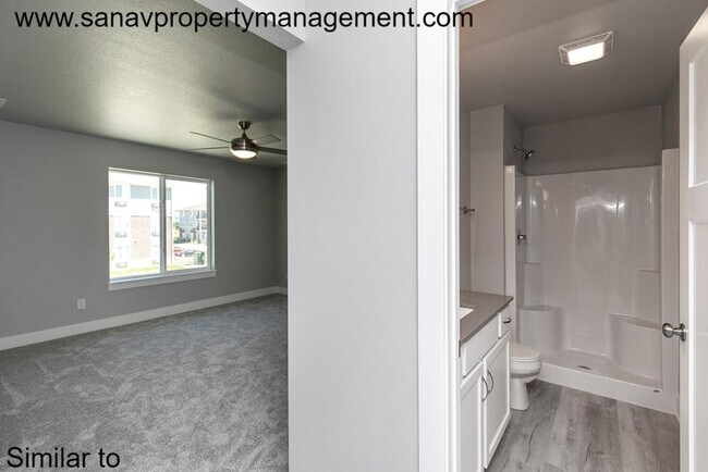Building Photo - Stunning 4-Bedroom Home with Finished Base...
