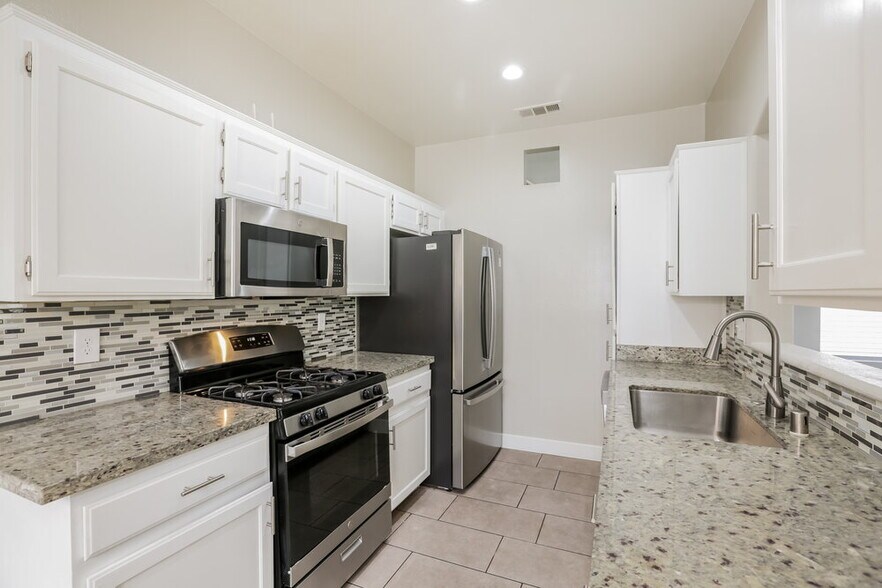 Building Photo - 10025 Camino Loma Verde Ave
