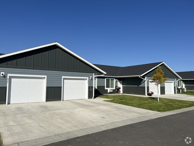 Attached garage/driveway included - Jayhawks Patio Home Apartments