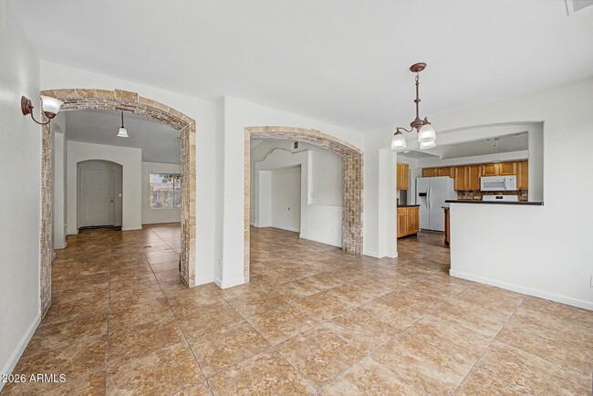 Building Photo - 6616 W Aire Libre Ave