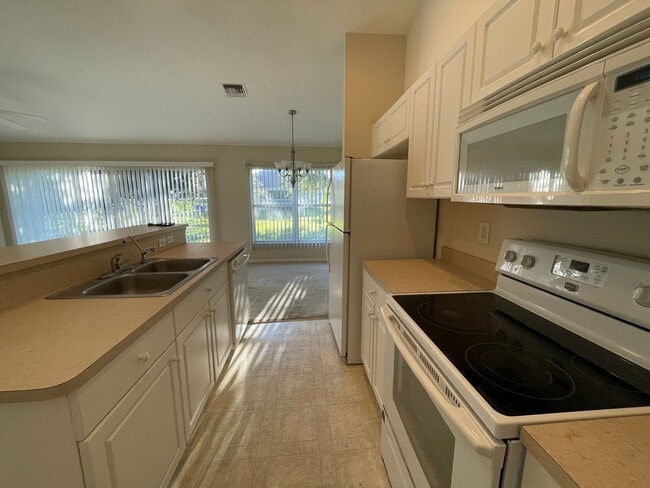 Building Photo - PRICE REDUCTION: Spacious and Charming 3 B...
