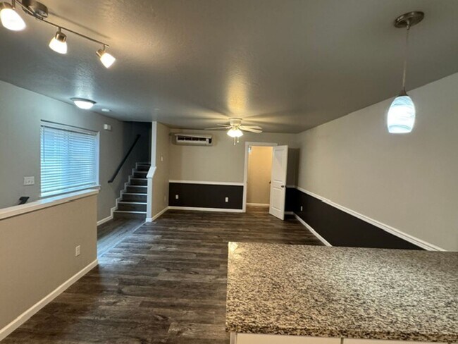 Building Photo - LIKE - NEW 3- BEDROOM TOWNHOME W/ GARAGE, FENCED YARD & PRIVATE 3RD BEDROOM OFF GARAGE