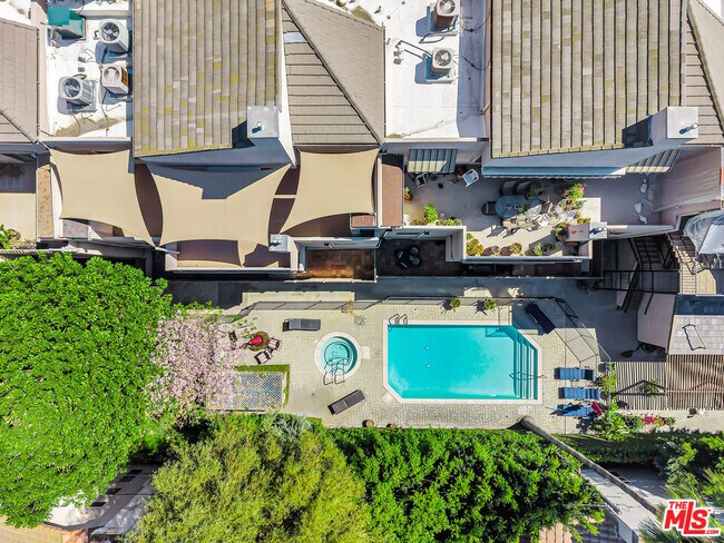 Building Photo - 4477 Woodman Ave