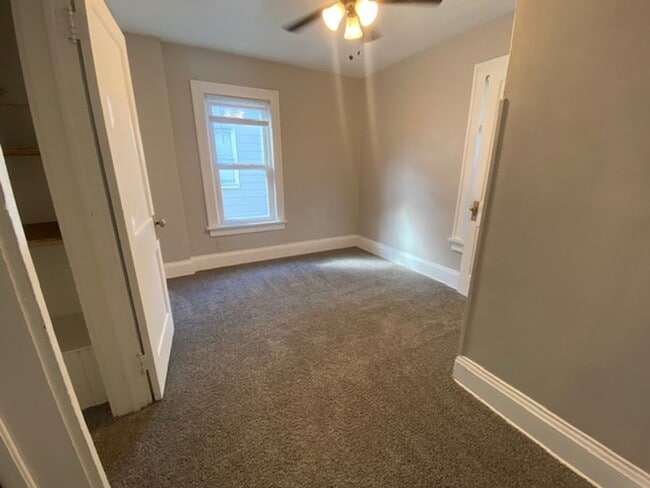 Building Photo - Updated 4-Bed with Porch & 2-Car Garage on...