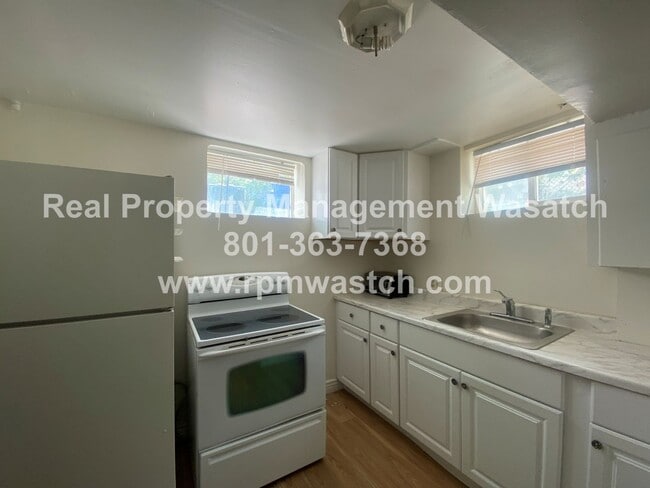 Building Photo - Come See this 2 bedroom 1 bath basement apartment in Salt Lake City With $500 Off First Month Rent1!