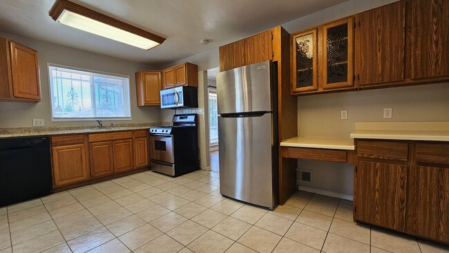 Building Photo - Spacious 5-Bedroom Ranch with Finished Basement & Oversized Garage!