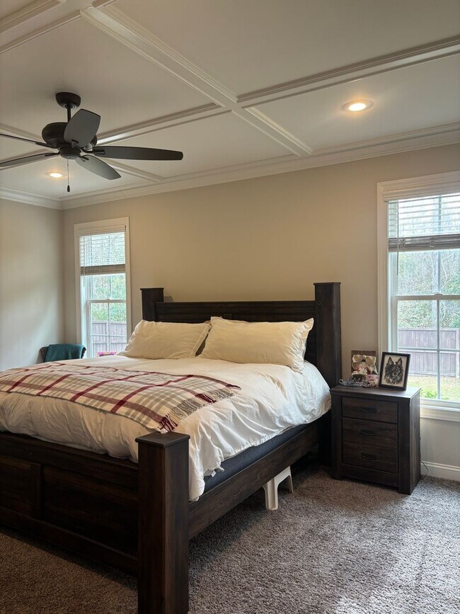 Building Photo - Spacious 4BR/3BA Creekside West Home with Screened Porch, Fenced Yard & 3-Car Garage