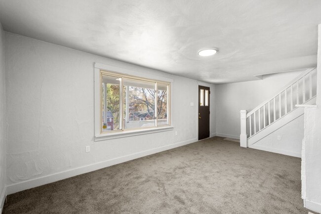 Building Photo - MOVE IN SPECIAL! SCORE HALF OFF 1ST MONTH'...