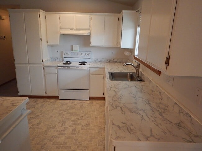 Building Photo - Home Near Schools - Fresh Paint and Floori...